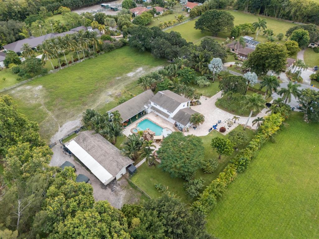 8233 Stagecoach Lane Boca Raton, FL 33496 - Photo 3 of 88 an aerial view of residential house with outdoor space and trees all around
