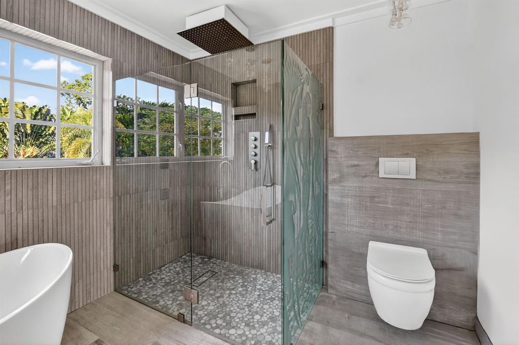 8233 Stagecoach Lane Boca Raton, FL 33496 - Photo 51 of 88 a bathroom with a toilet sink and shower