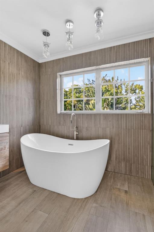 8233 Stagecoach Lane Boca Raton, FL 33496 - Photo 53 of 88 a white bath tub sitting in a room next to a window