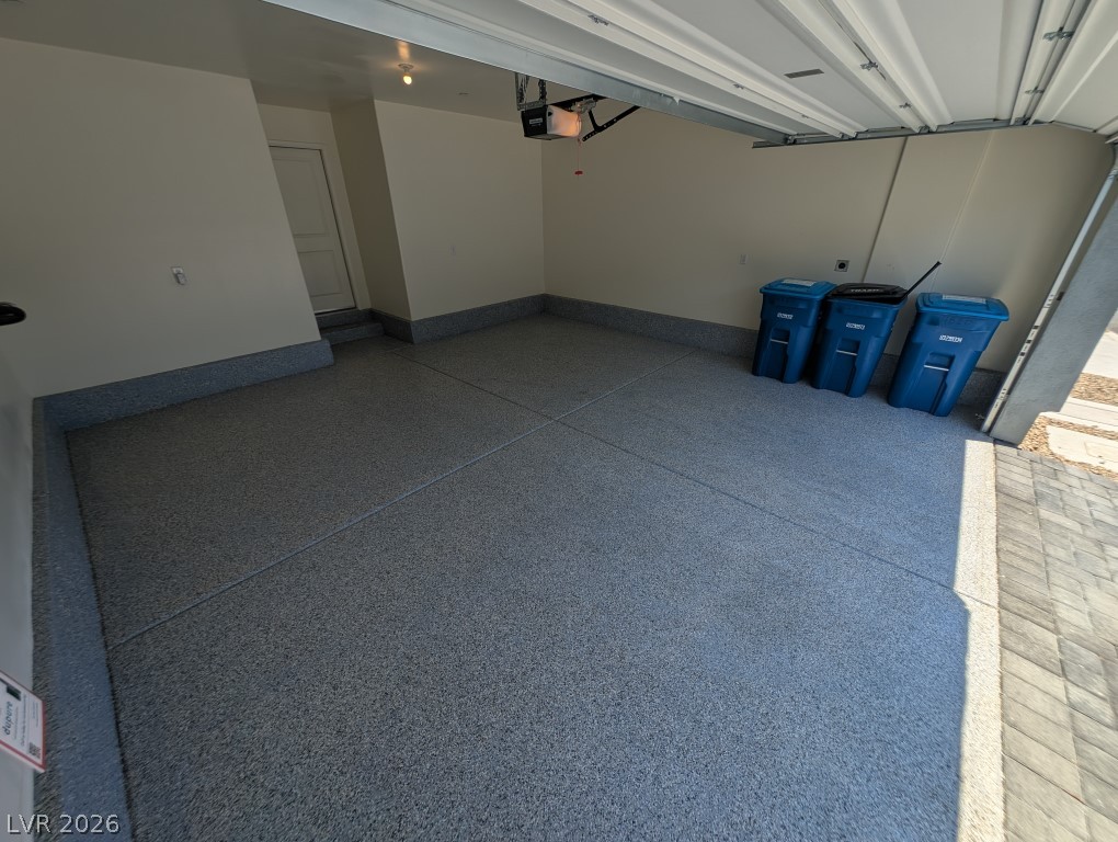 4820 Orchid Rdg Avenue Las Vegas, NV 89141 - Photo 27 of 27 A pristine epoxy-coated floor offers exceptional durability for this spacious garage.
