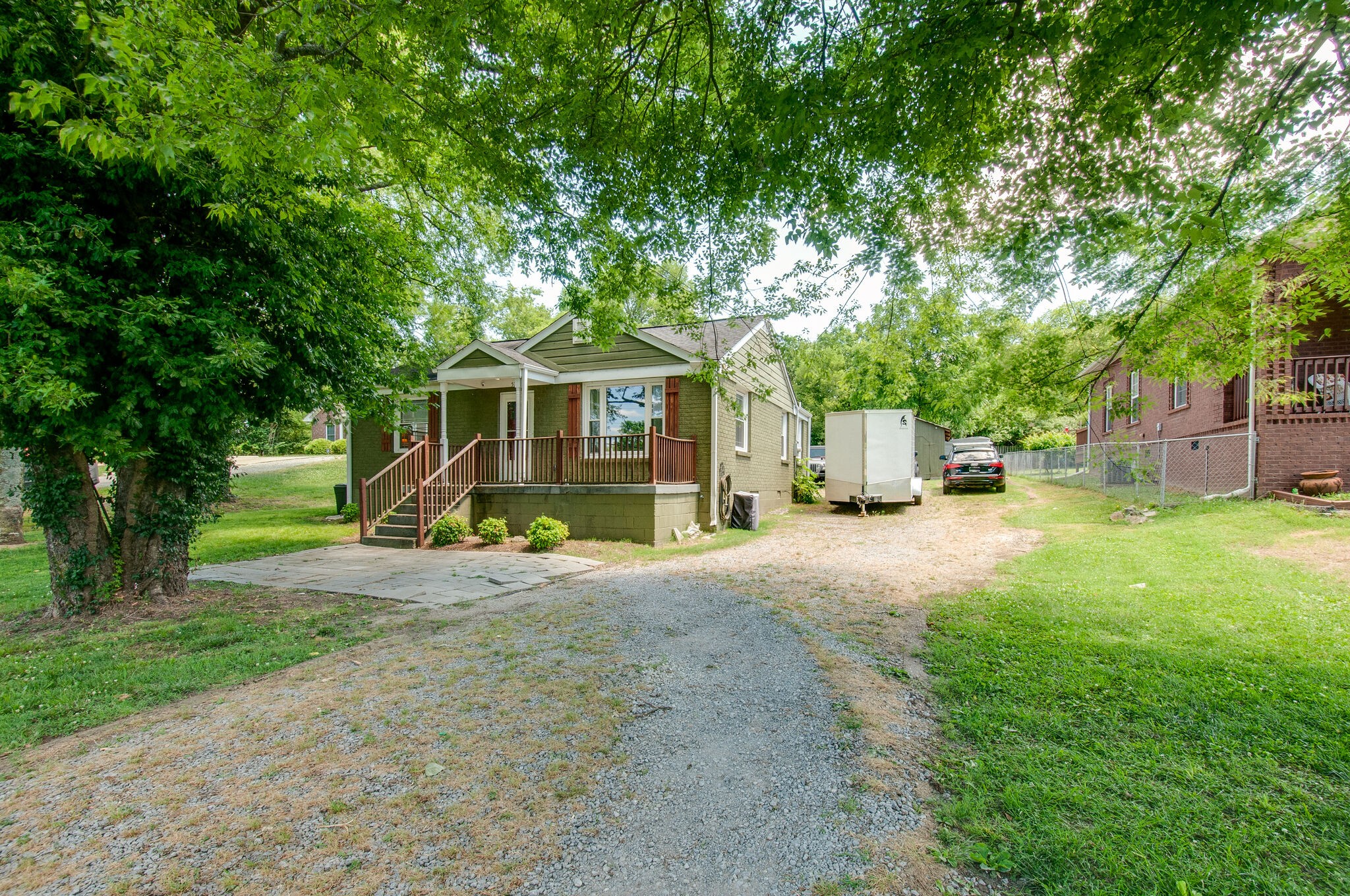 579 Neelys Bend Road Madison, TN 37115 - Photo 4 of 24 a view of a house with a yard and tree s