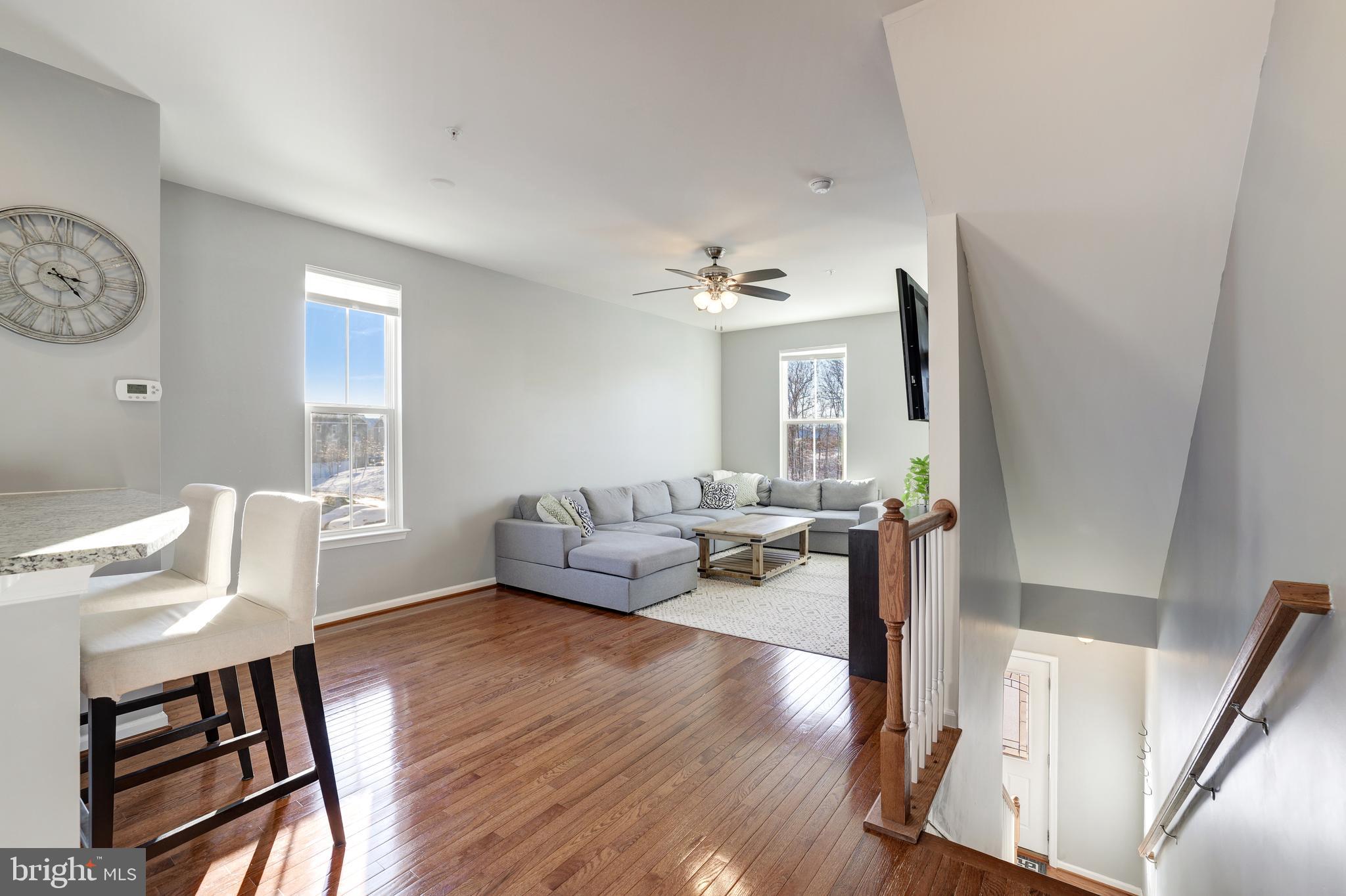 24845 Coats Square Aldie, VA 20105 - Photo 19 of 40 a living room with furniture and a wooden floor