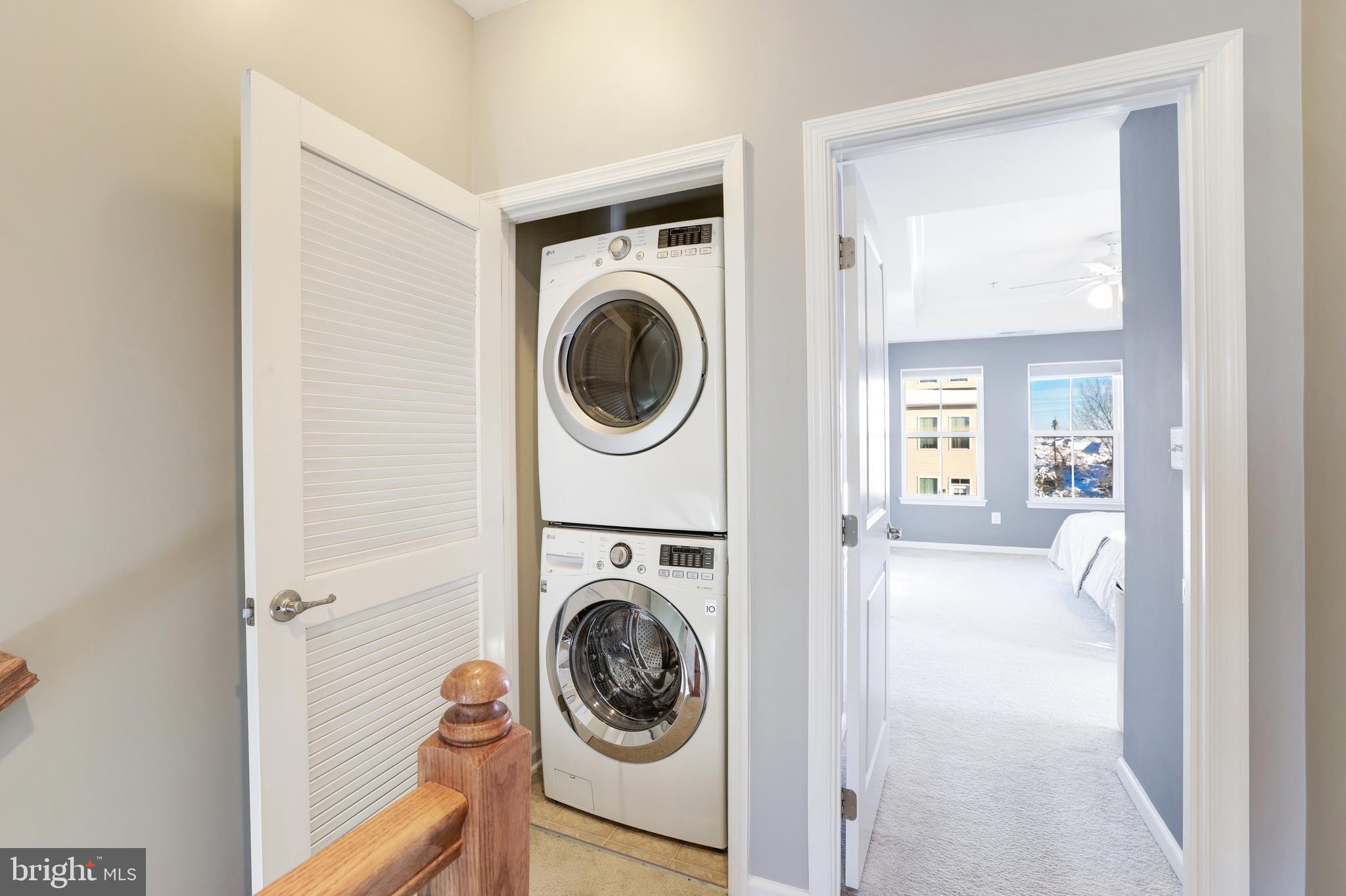 24845 Coats Square Aldie, VA 20105 - Photo 24 of 40 a view of a hallway with washer and dryer