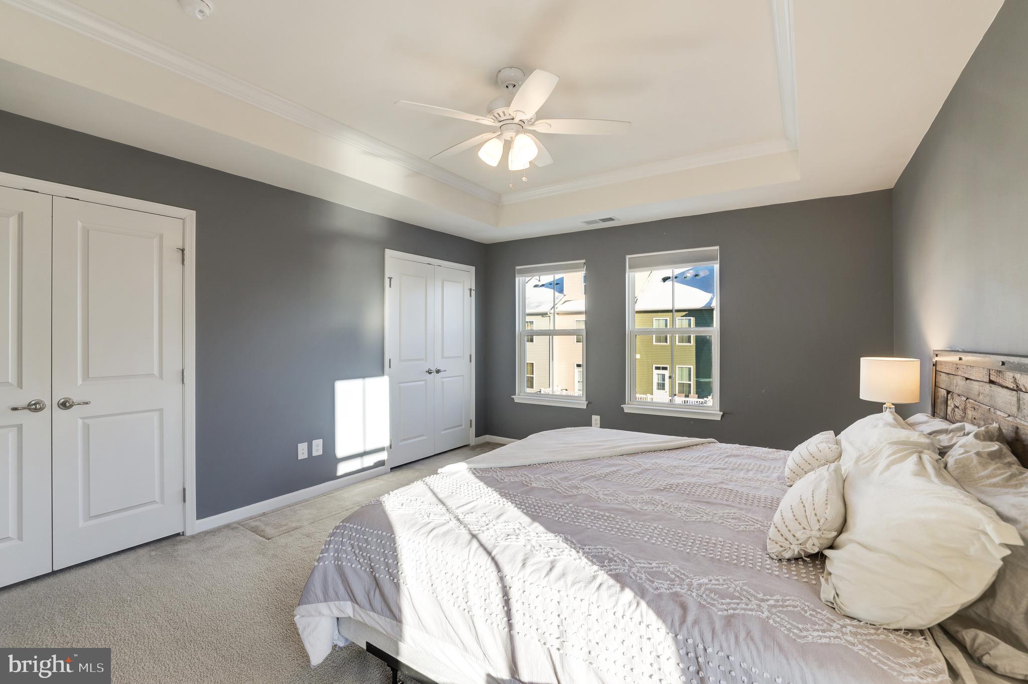 24845 Coats Square Aldie, VA 20105 - Photo 26 of 40 a bedroom with a large bed and a window