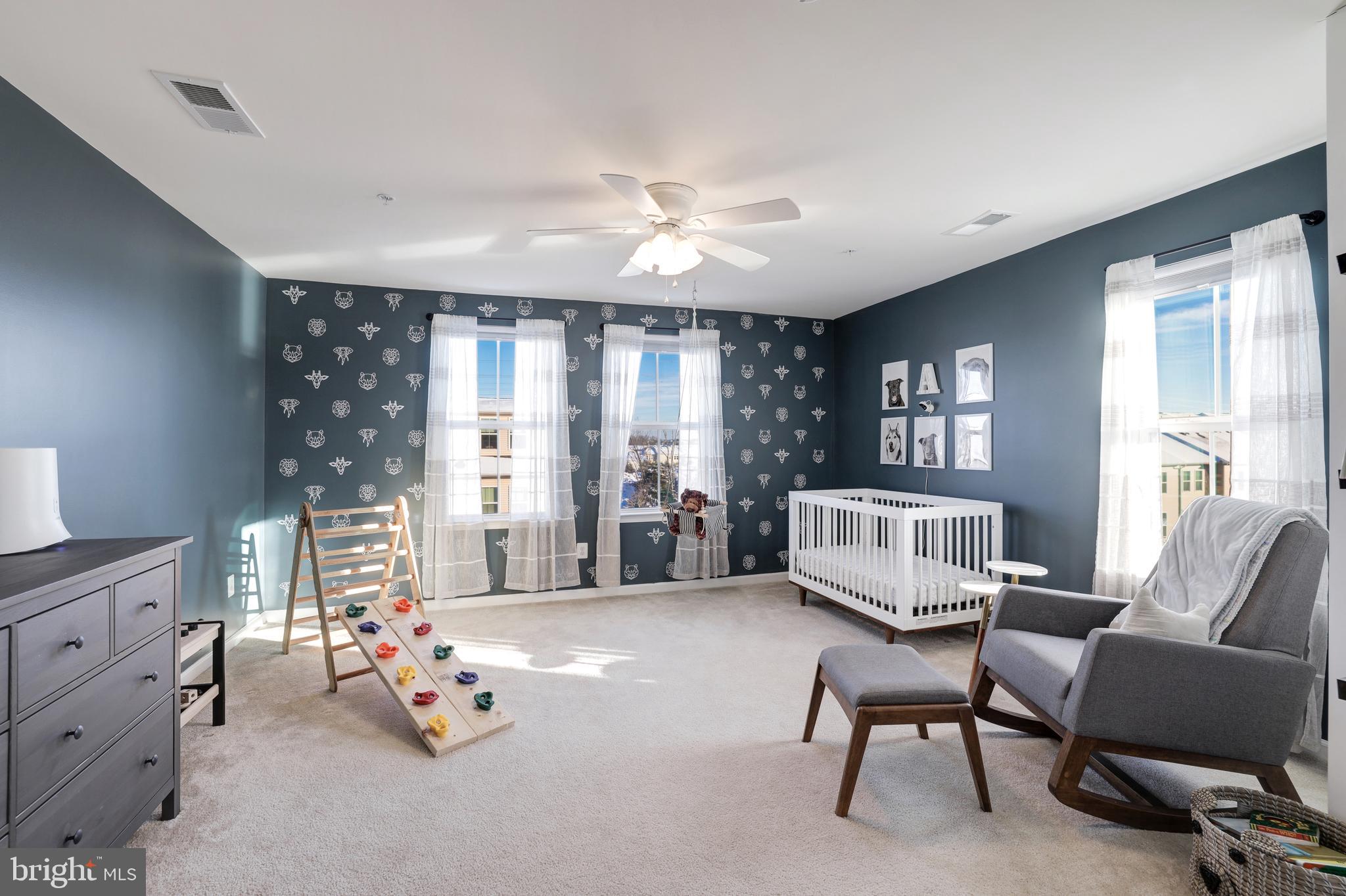 24845 Coats Square Aldie, VA 20105 - Photo 34 of 40 a bedroom with furniture and a large window