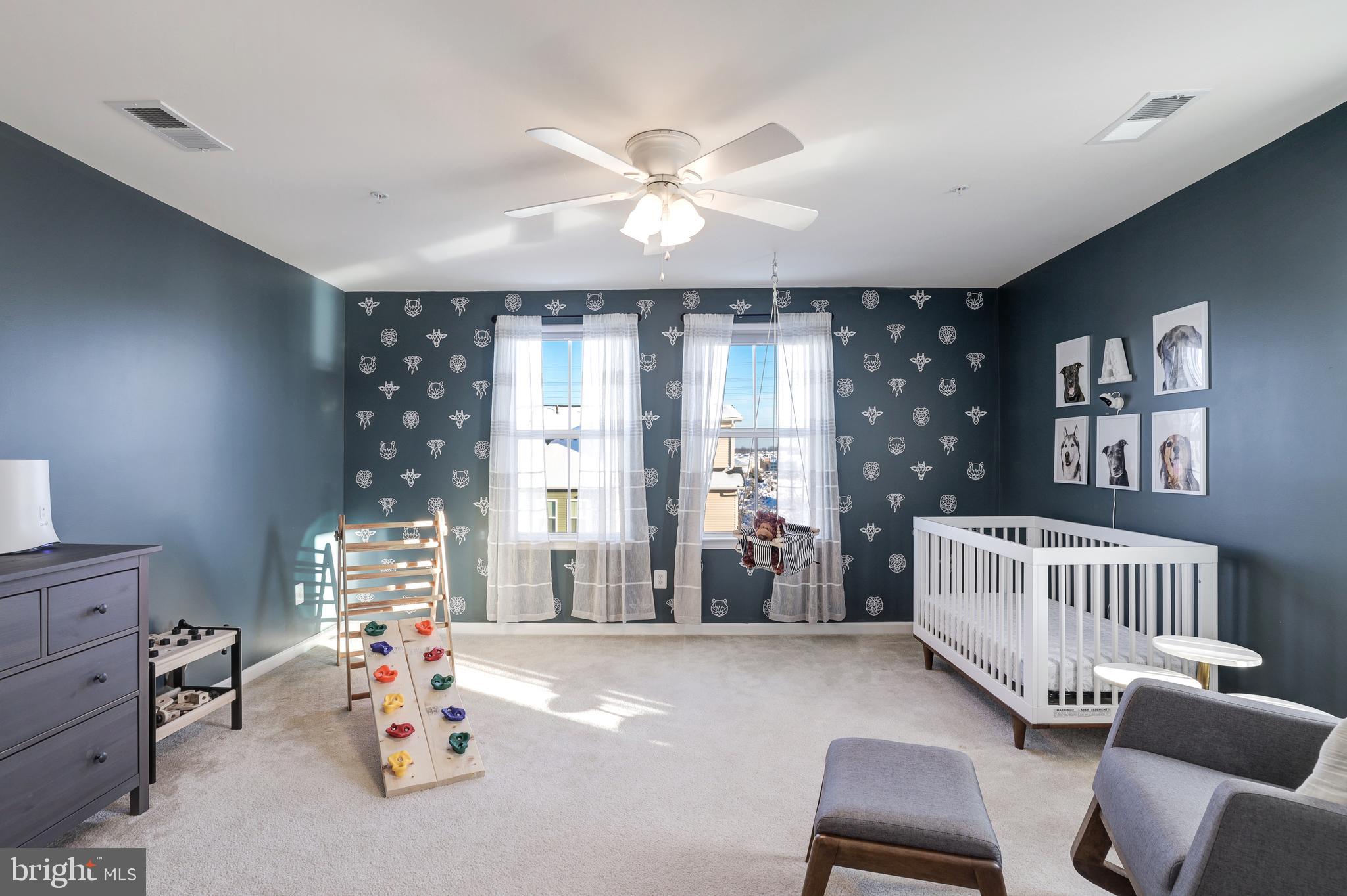 24845 Coats Square Aldie, VA 20105 - Photo 35 of 40 a bedroom with furniture and a large window