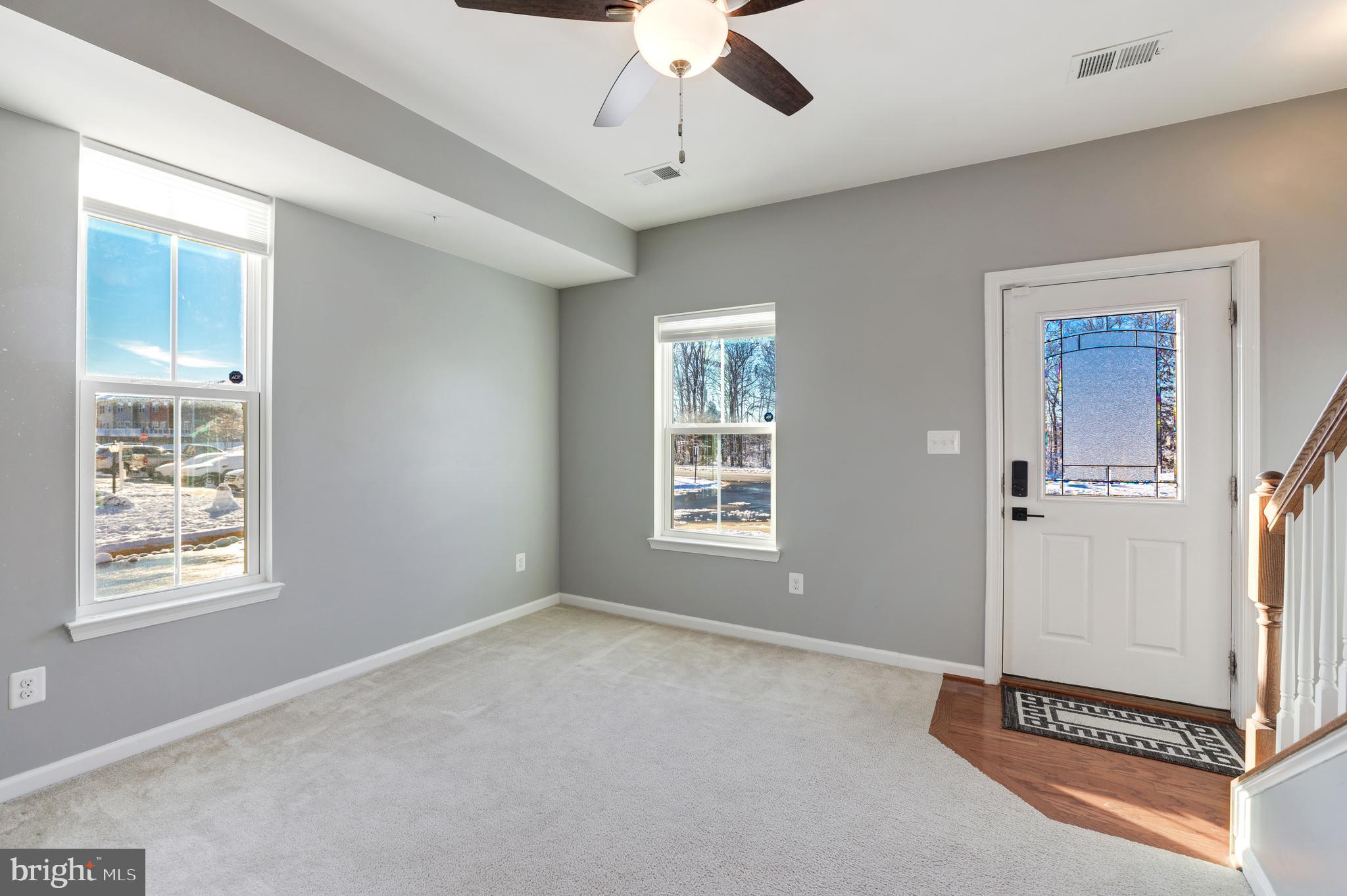 24845 Coats Square Aldie, VA 20105 - Photo 7 of 40 a living room with windows