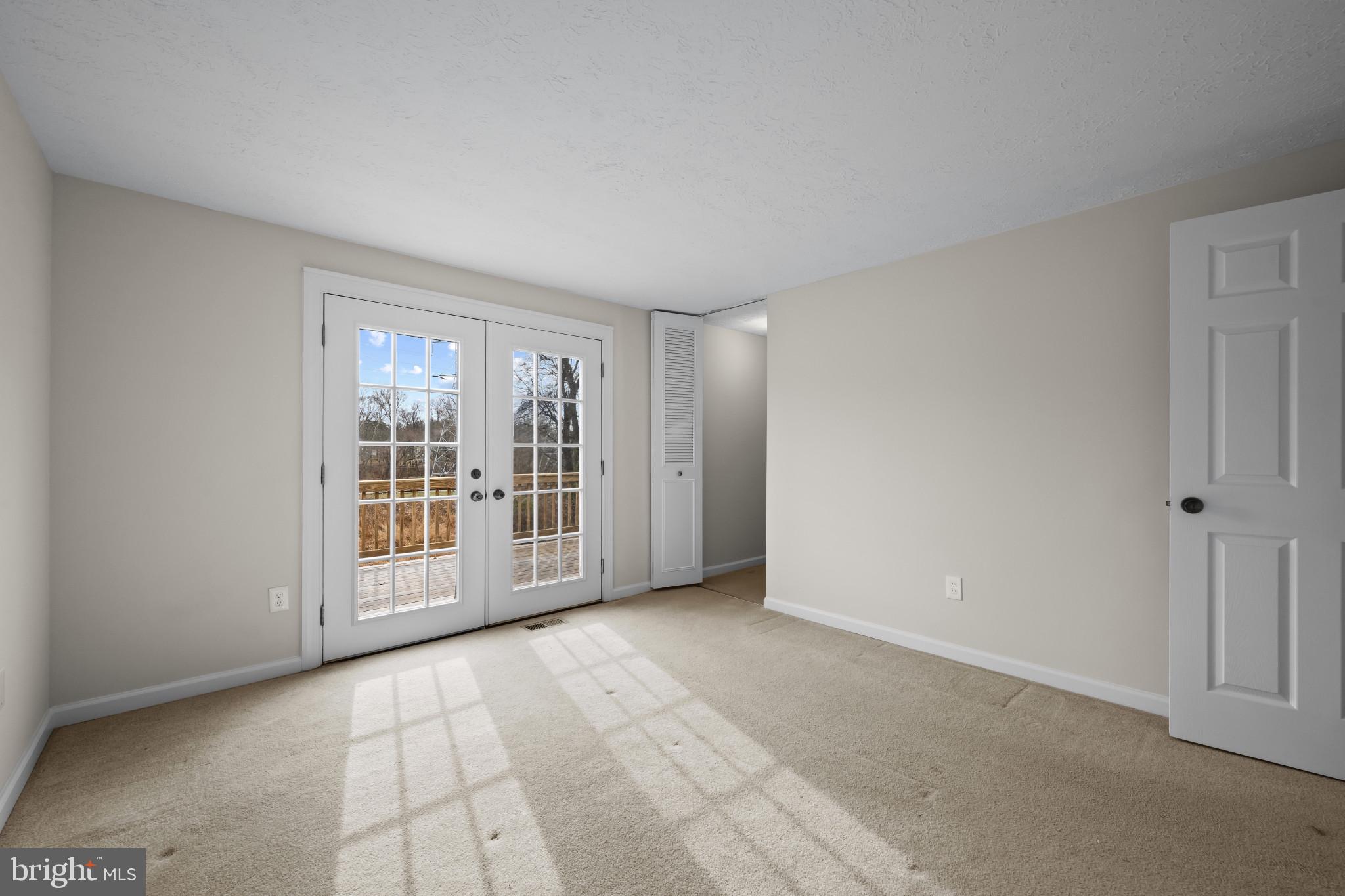 9281 Pigeon Wing Place Columbia, MD 21045 - Photo 26 of 55 a view of an empty room with a window