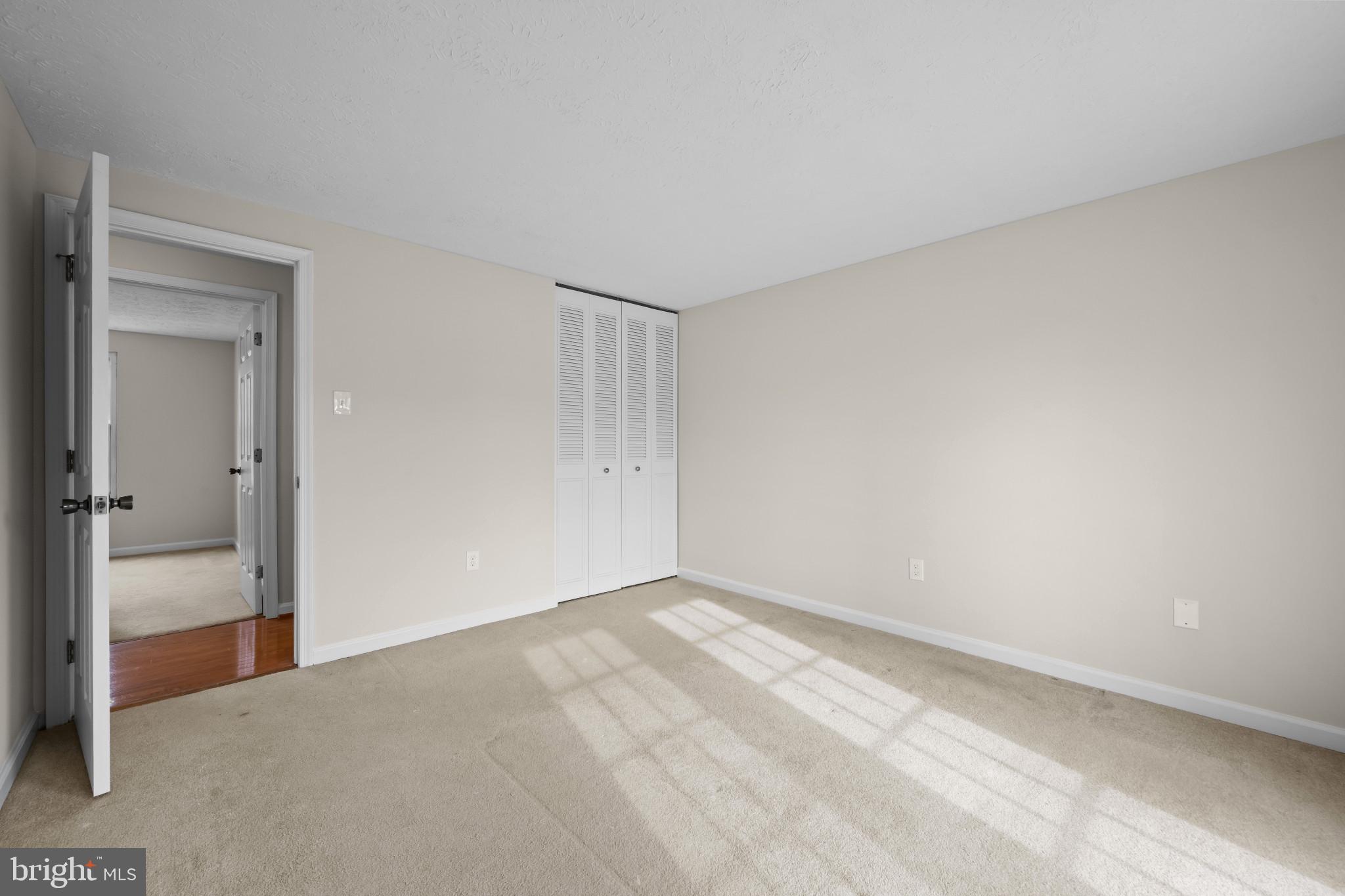 9281 Pigeon Wing Place Columbia, MD 21045 - Photo 28 of 55 a view of an empty room