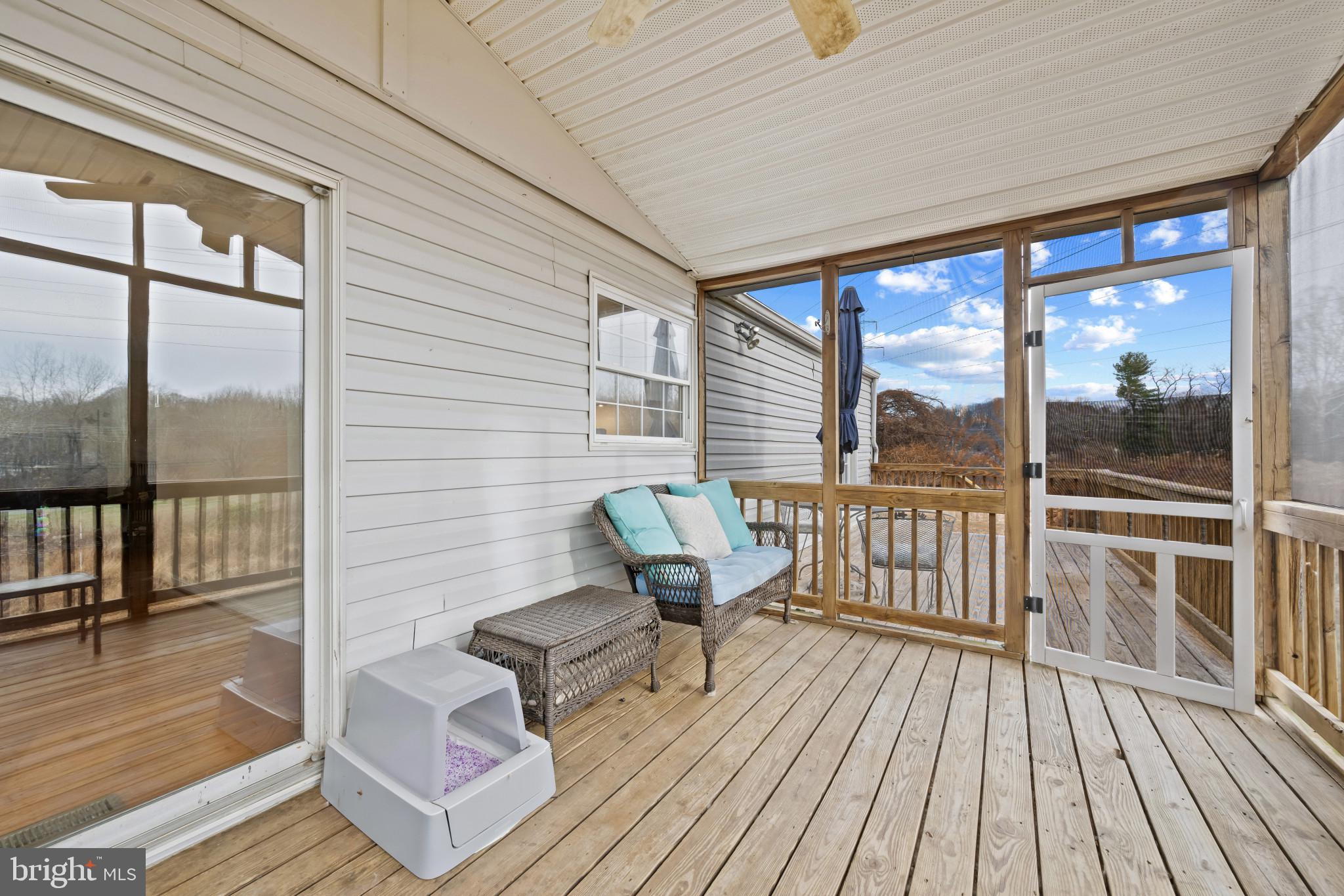 9281 Pigeon Wing Place Columbia, MD 21045 - Photo 45 of 55 a view of a two chairs in the balcony