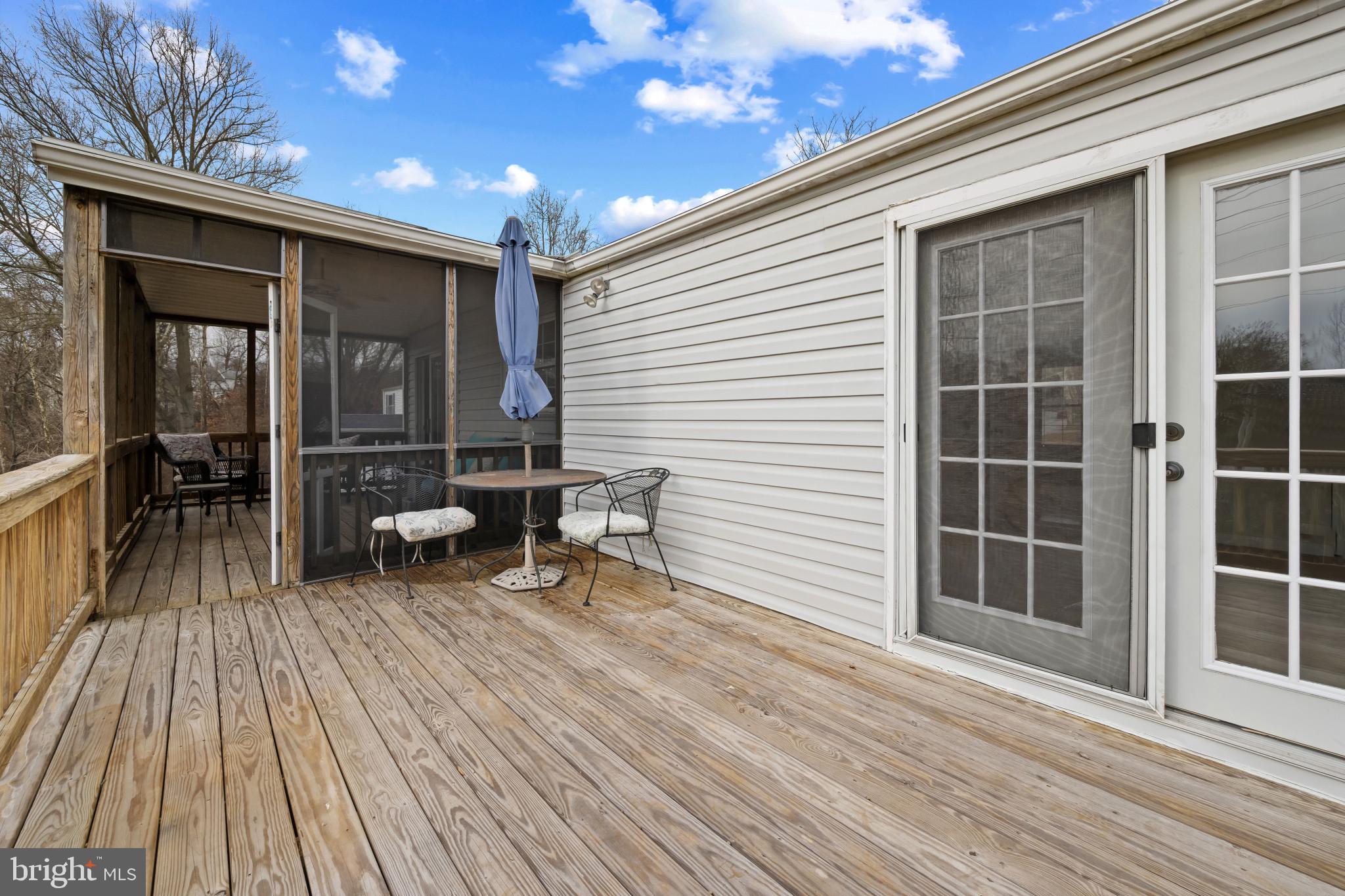 9281 Pigeon Wing Place Columbia, MD 21045 - Photo 46 of 55 a view of a chairs on the deck