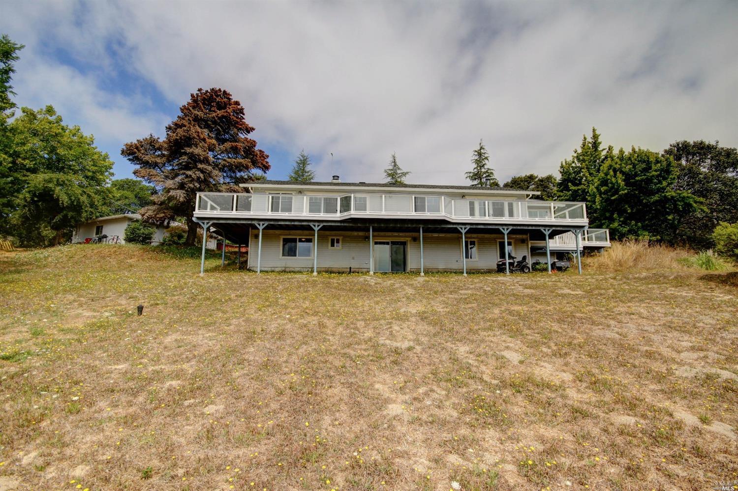 509 Grandview Road Sebastopol, CA 95472 - Photo 1 of 1 a view of a house with a backyard and a garden