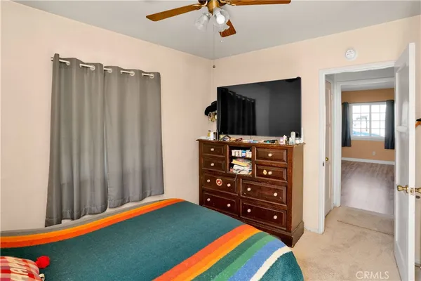 a kitchen with stainless steel appliances a stove a sink and a refrigerator