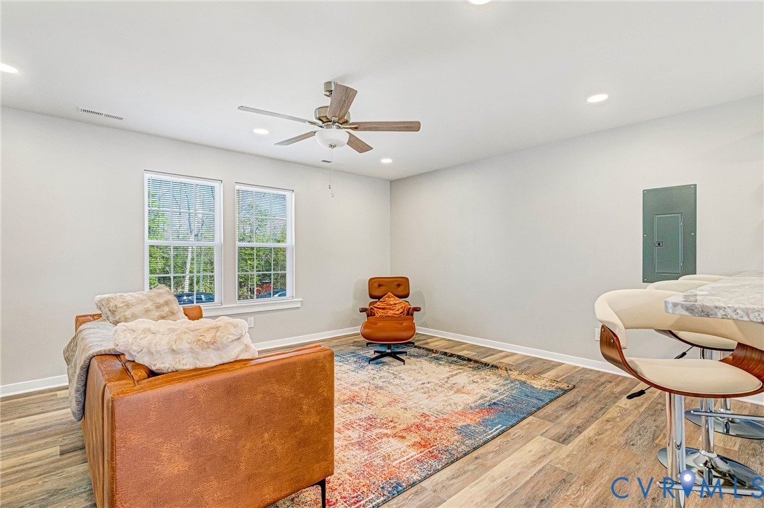 5301 Pine Fork Road Quinton, VA 23141 - Photo 14 of 41 a room with furniture and wooden floor