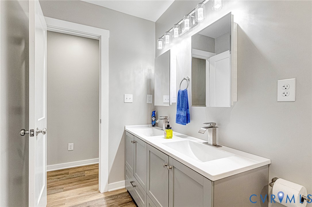5301 Pine Fork Road Quinton, VA 23141 - Photo 29 of 41 a bathroom with a sink a toilet and shower