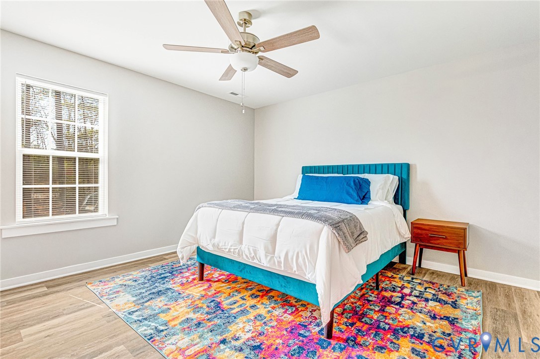 5301 Pine Fork Road Quinton, VA 23141 - Photo 35 of 41 a bedroom with a bed and a window