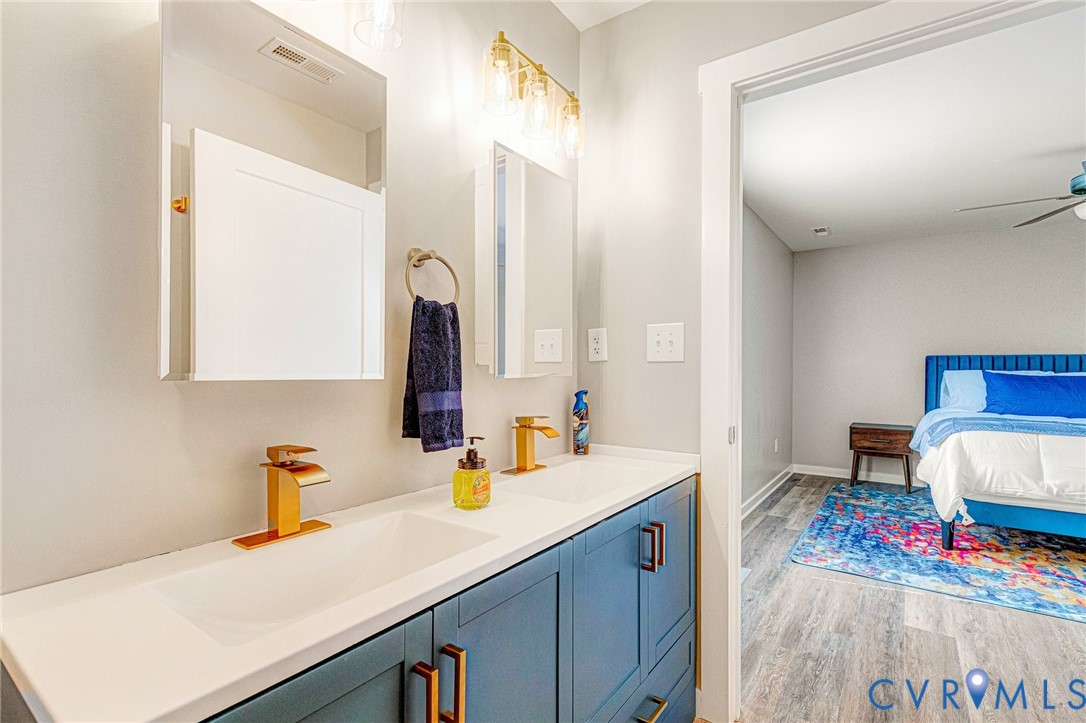 5301 Pine Fork Road Quinton, VA 23141 - Photo 39 of 41 a bathroom with a sink and a mirror