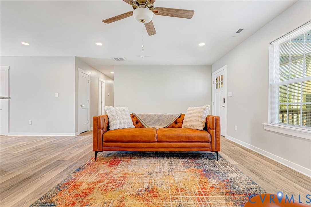 5301 Pine Fork Road Quinton, VA 23141 - Photo 9 of 41 a living room with furniture and a window