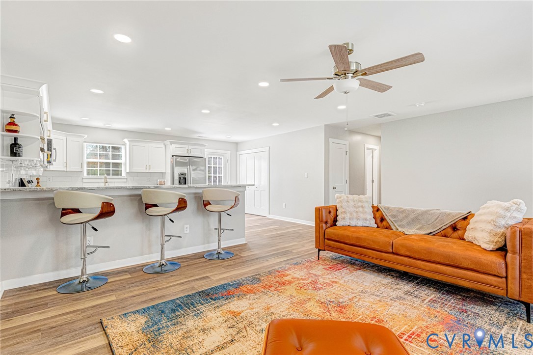 5301 Pine Fork Road Quinton, VA 23141 - Photo 10 of 41 a living room with furniture and a rug