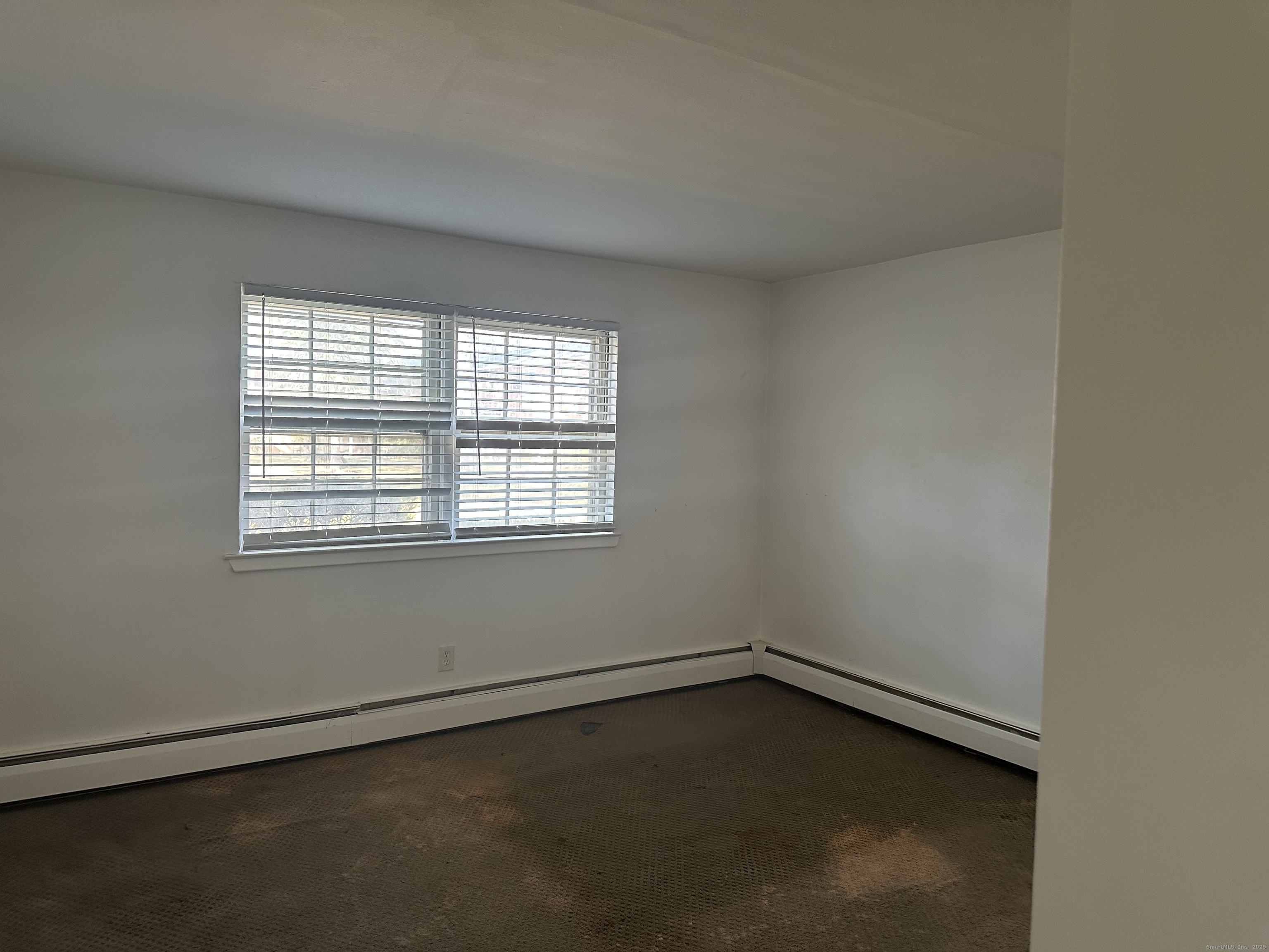 5 Treat Street, Unit 2A West Haven, CT 06516 - Photo 13 of 15 an empty room with a window