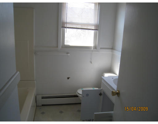 27 Broadcommon Road Bristol, RI 02809 - Photo 5 of 9 a bathroom with a window