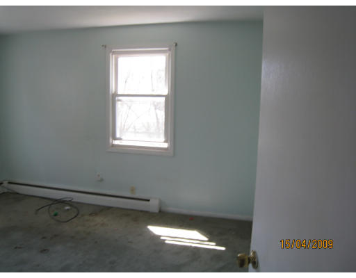 27 Broadcommon Road Bristol, RI 02809 - Photo 6 of 9 a view of a window in an empty room