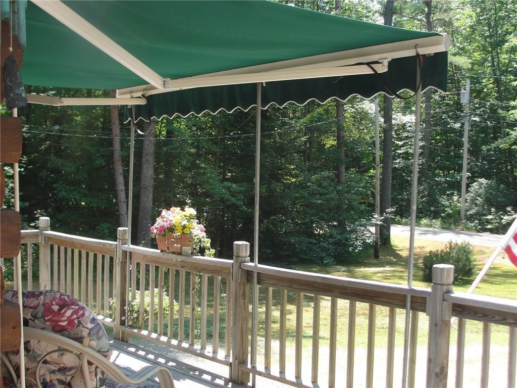 12 Chickadee Road Bridgton, ME 04009 - Photo 8 of 35 The awning.