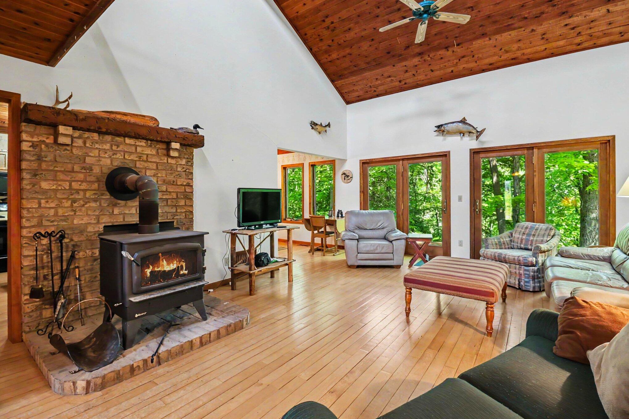 780 East Conrad Road Scottville, MI 49454 - Photo 6 of 34 Cozy wood burning fireplace