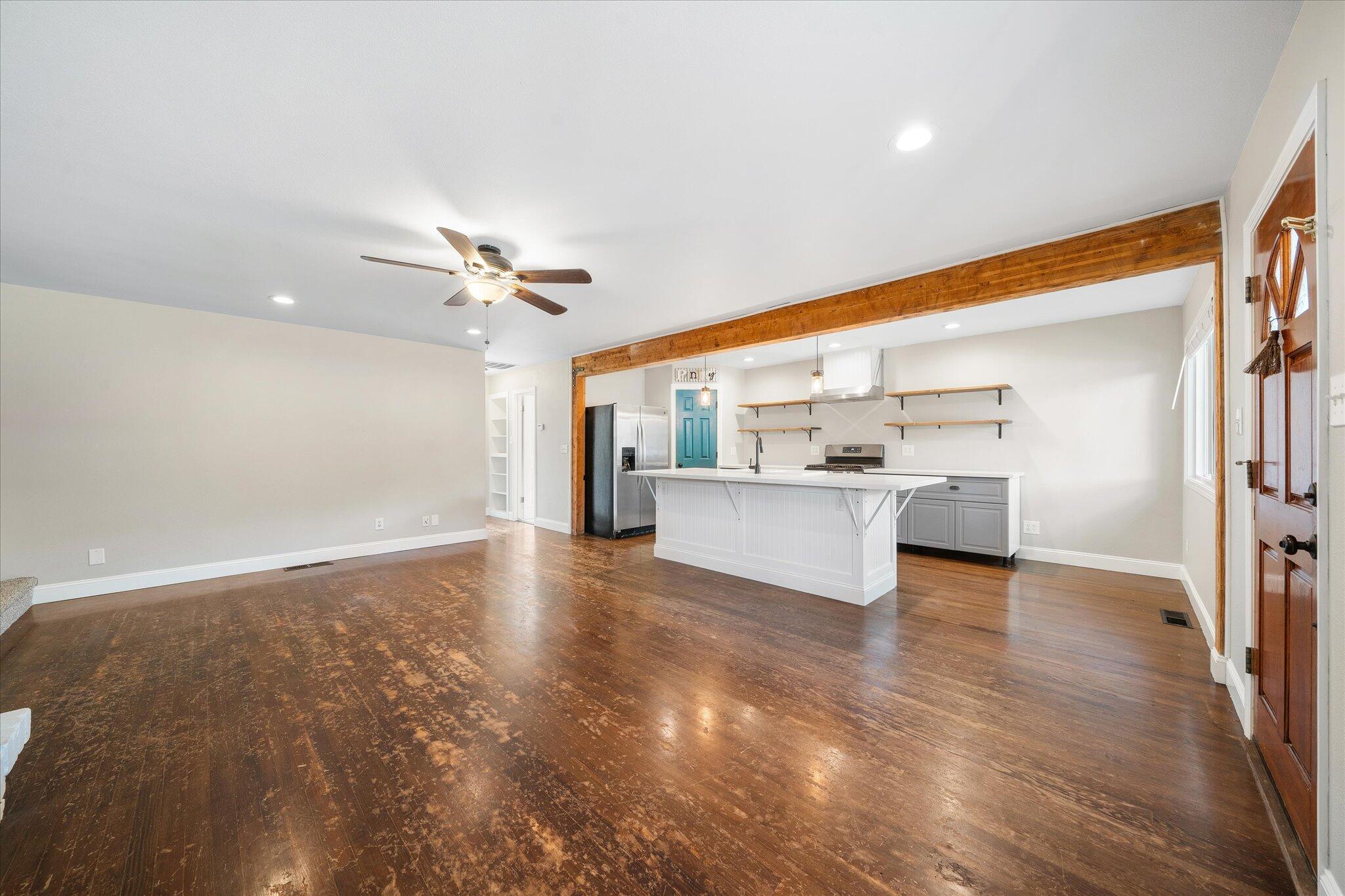 2717 Henderson Road Redding, CA 96002 - Photo 5 of 34 a view of a kitchen with a sink and a refrigerator