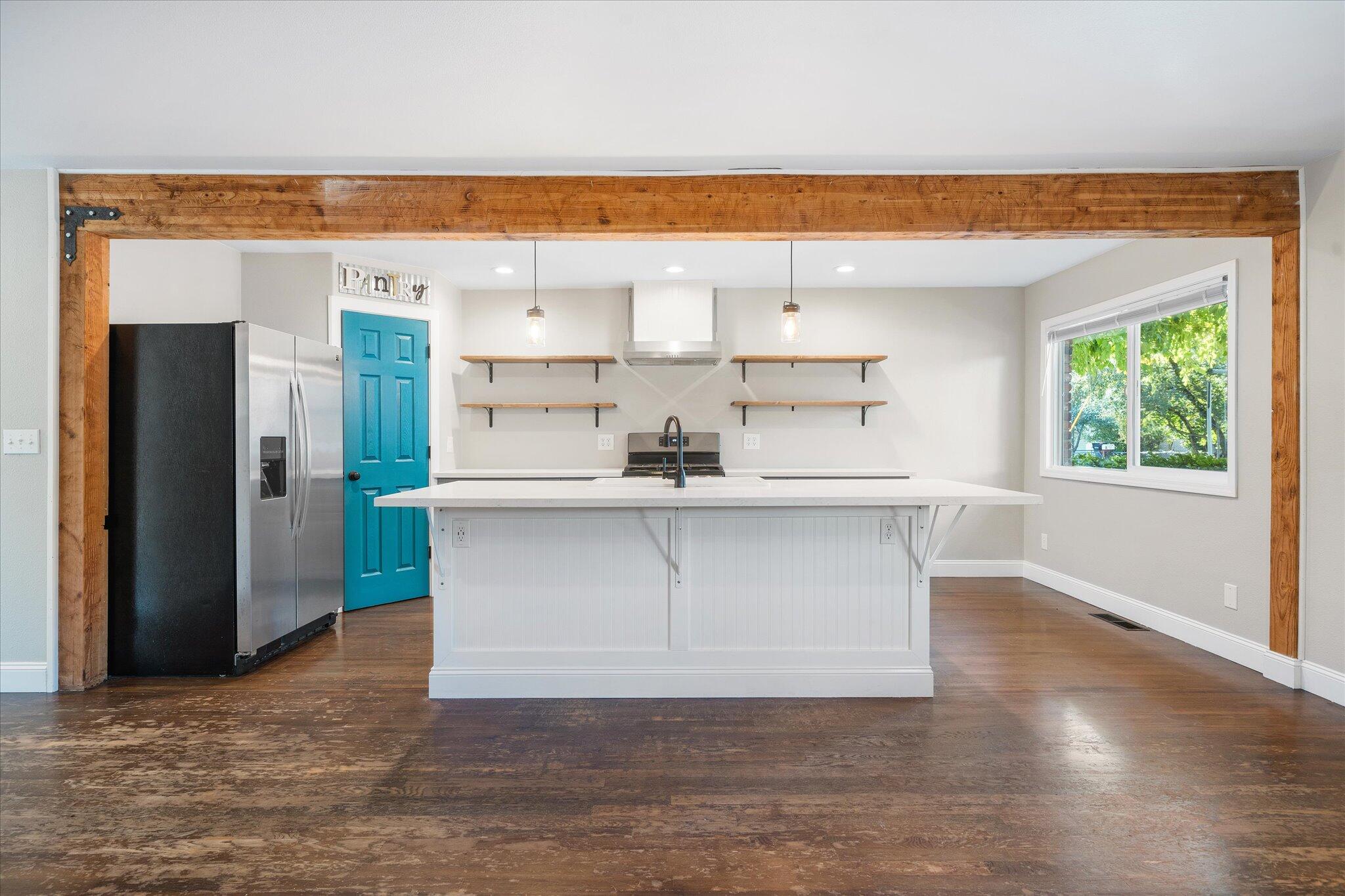2717 Henderson Road Redding, CA 96002 - Photo 6 of 34 a view of kitchen with stainless steel appliances cabinets and wooden floor