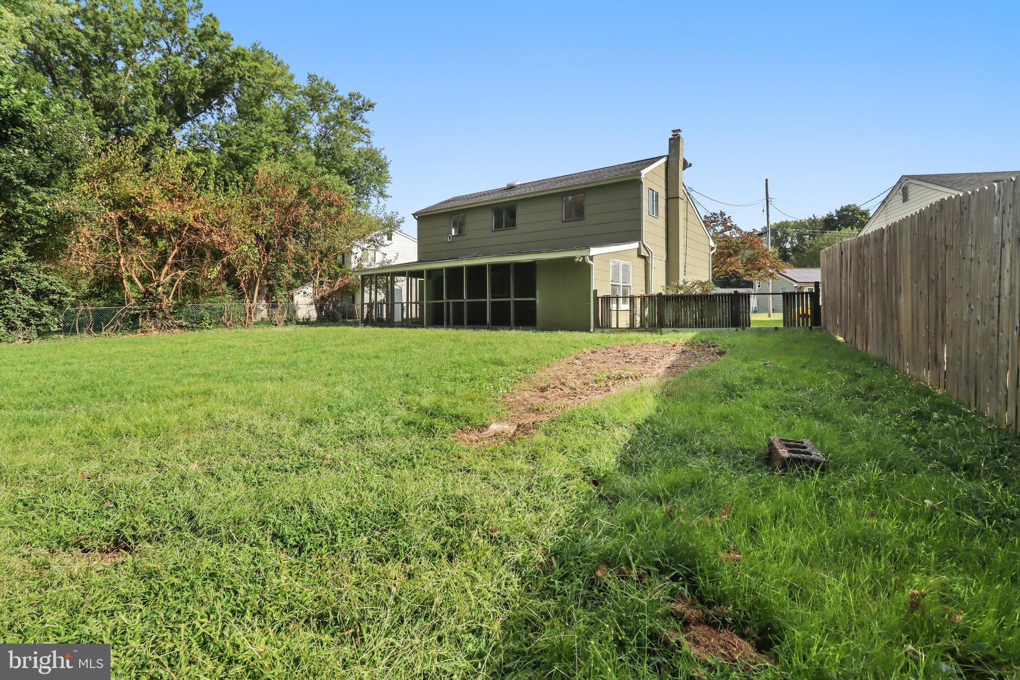 197 Pine Avenue Salem, NJ 08079 - Photo 19 of 20 a view of a house with backyard and garden