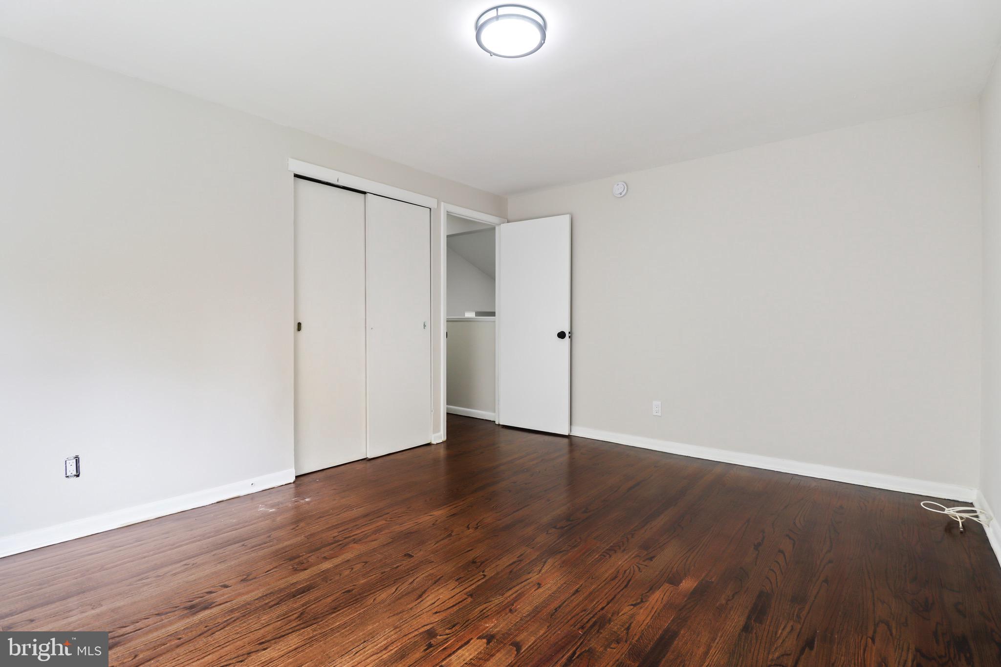 197 Pine Avenue Salem, NJ 08079 - Photo 10 of 20 a view of an empty room with wooden floor