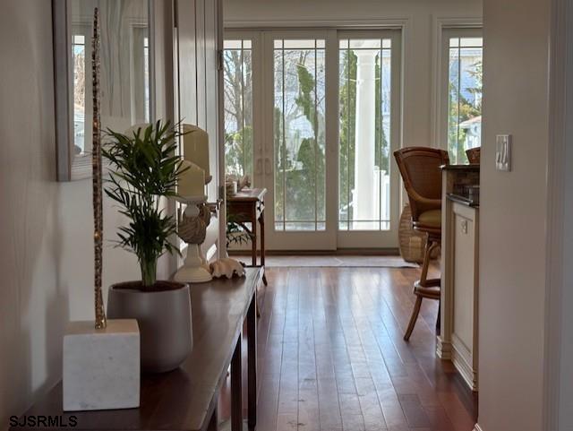 165 Pinnacle Road Ocean City, NJ 08226 - Photo 12 of 34 a view of a livingroom with furniture and a floor to ceiling window