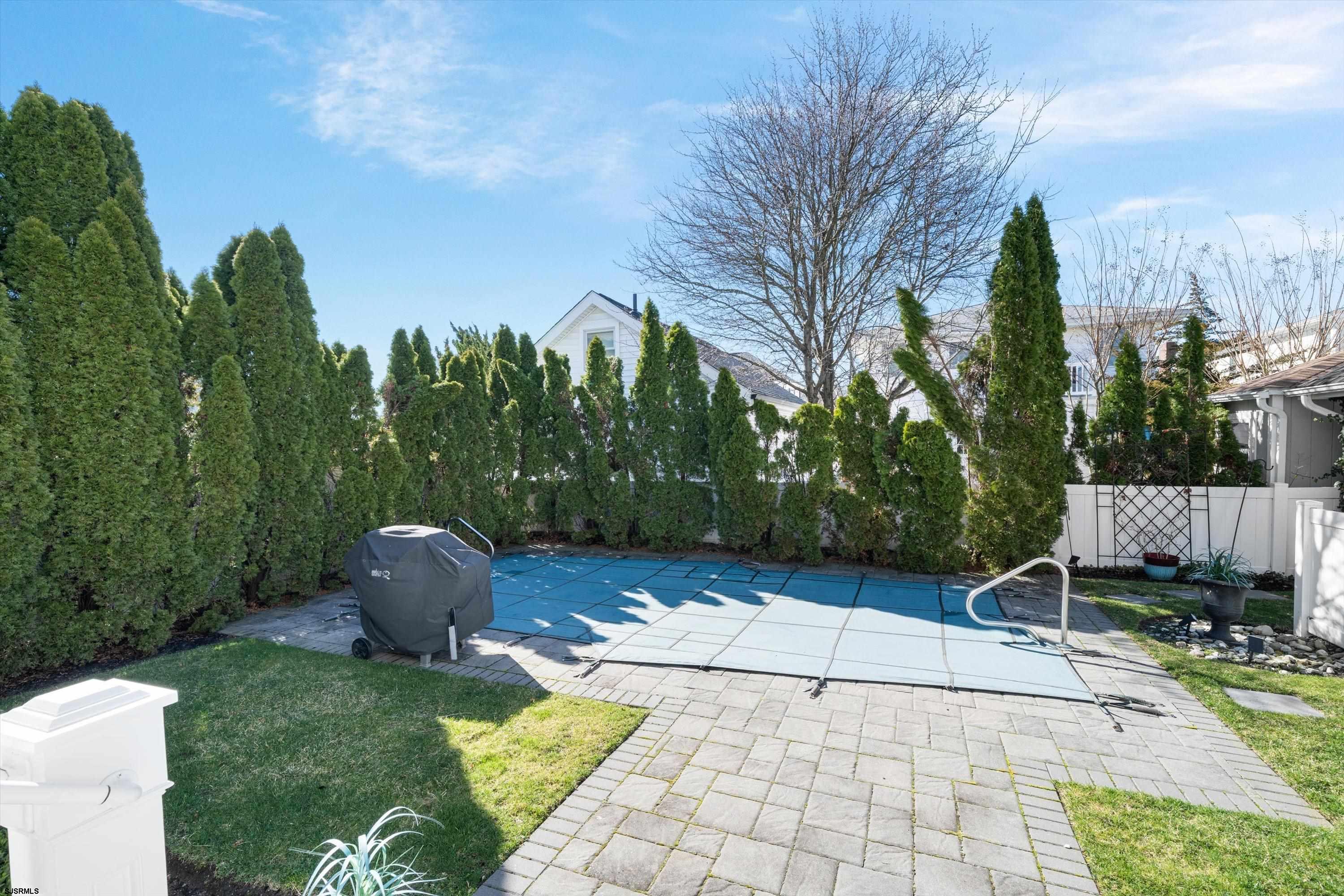 165 Pinnacle Road Ocean City, NJ 08226 - Photo 20 of 34 a view of a backyard with furniture