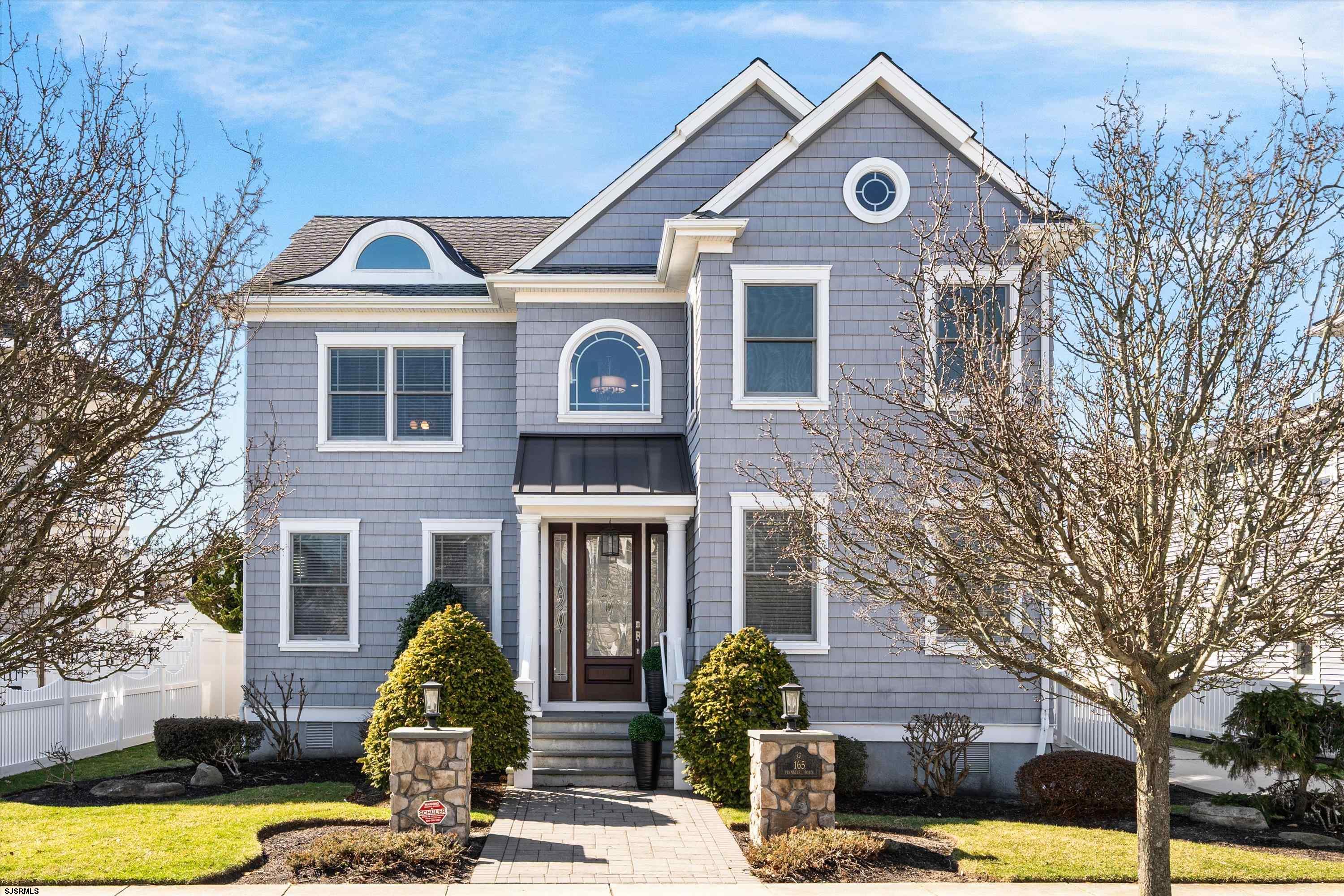 165 Pinnacle Road Ocean City, NJ 08226 - Photo 2 of 34 a front view of a house with swimming pool