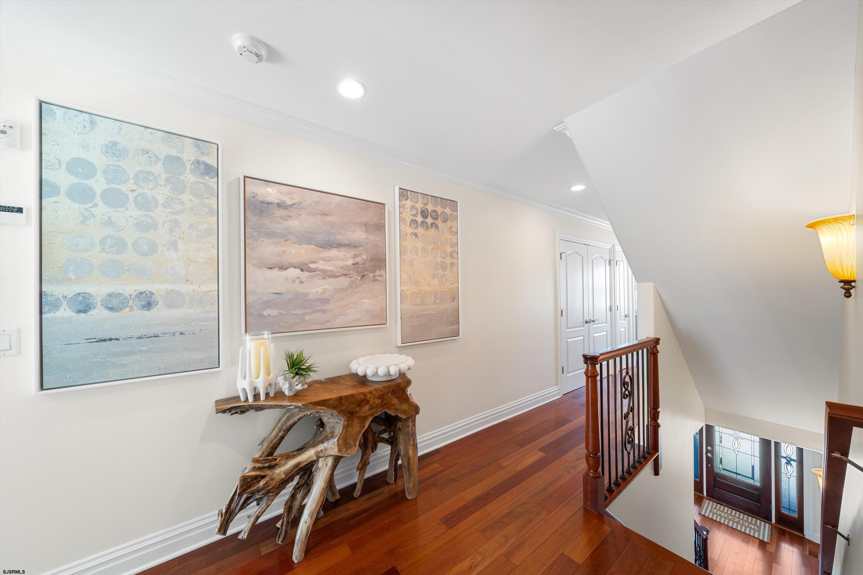 165 Pinnacle Road Ocean City, NJ 08226 - Photo 22 of 34 a view of a livingroom with furniture wooden floor and windows