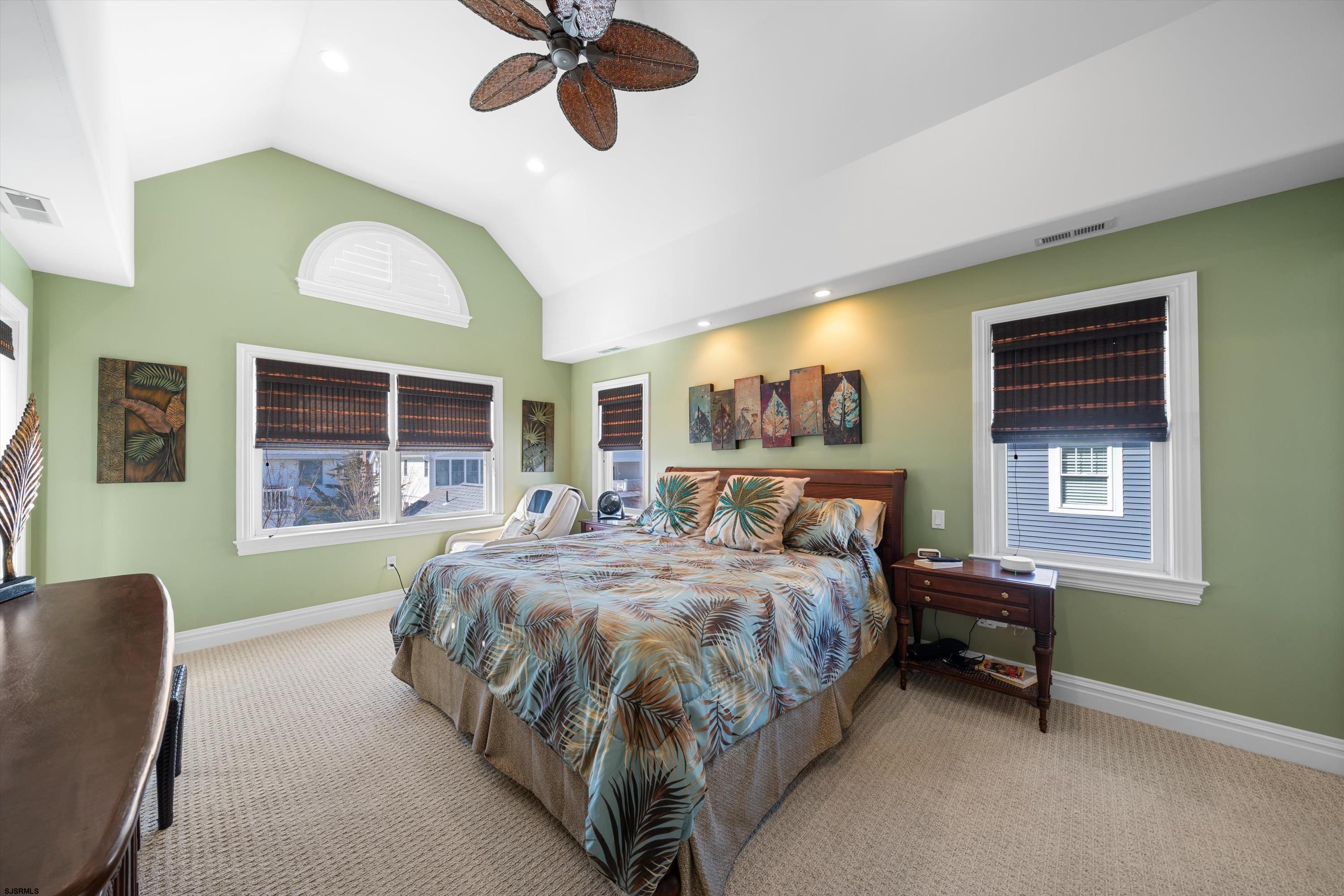 165 Pinnacle Road Ocean City, NJ 08226 - Photo 25 of 34 a bed room with a bed and a chair