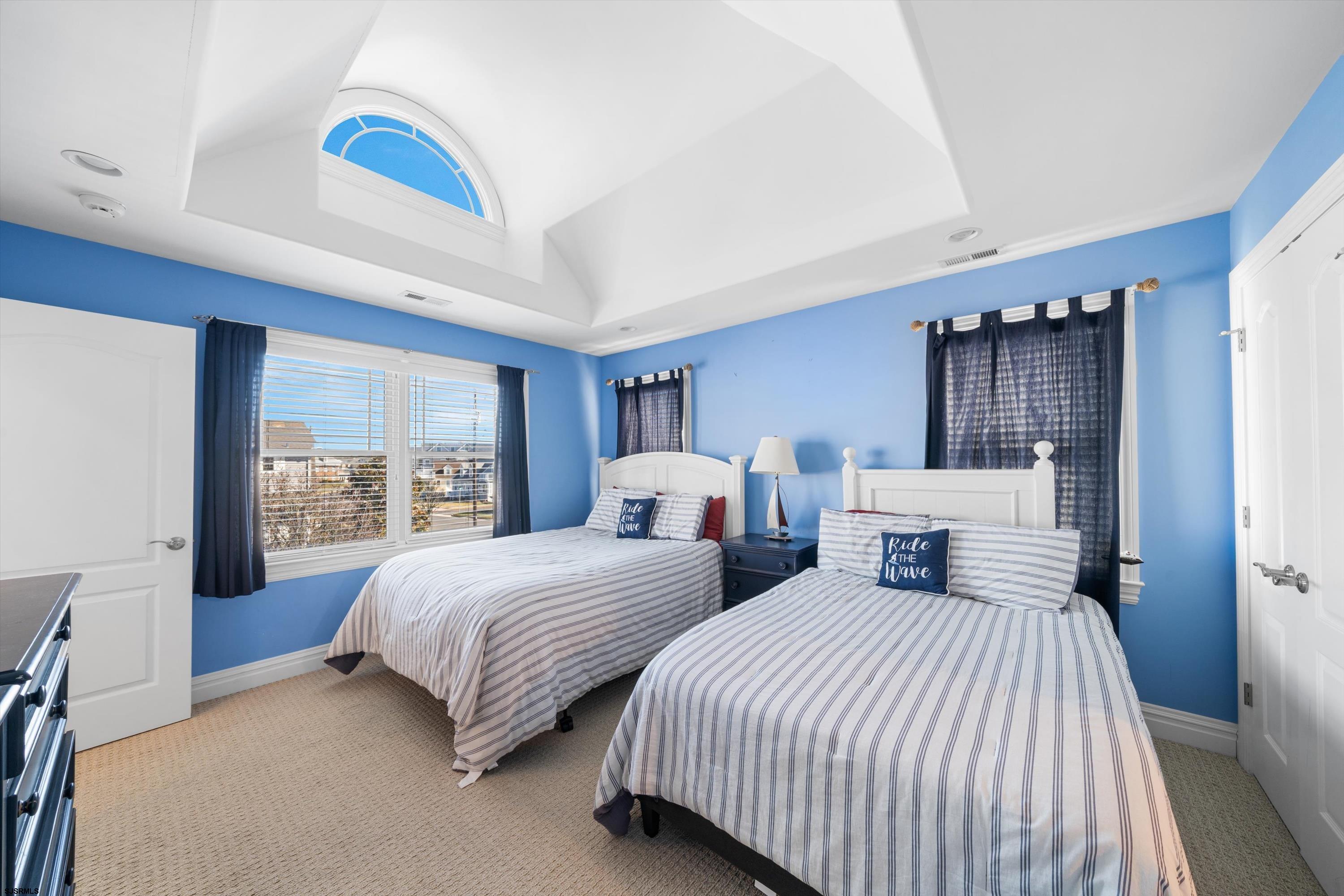 165 Pinnacle Road Ocean City, NJ 08226 - Photo 29 of 34 a bedroom with two beds and large windows