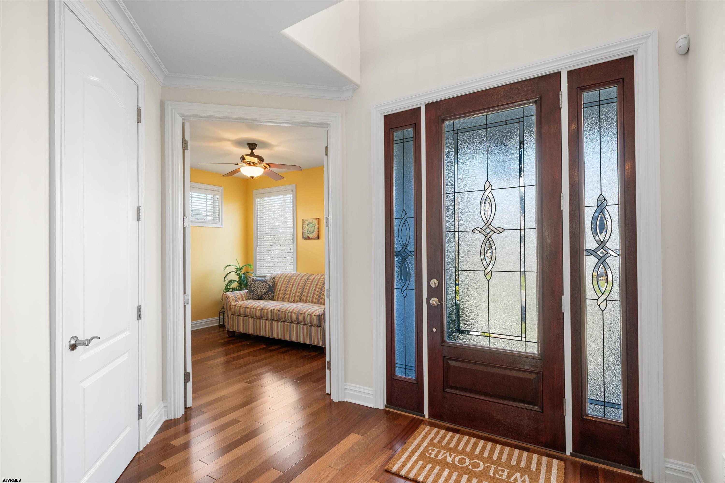 165 Pinnacle Road Ocean City, NJ 08226 - Photo 5 of 34 a view of a hallway with wooden floor and windows
