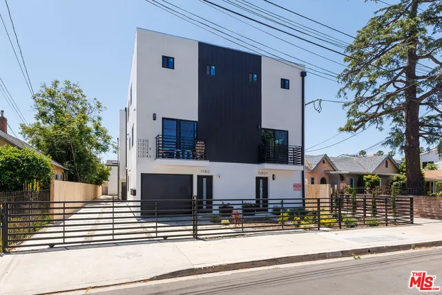 a front view of a house with street