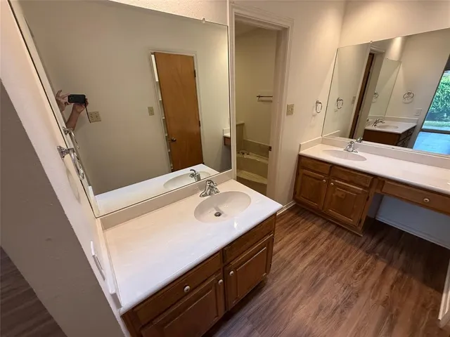 a bathroom with a sink and toilet