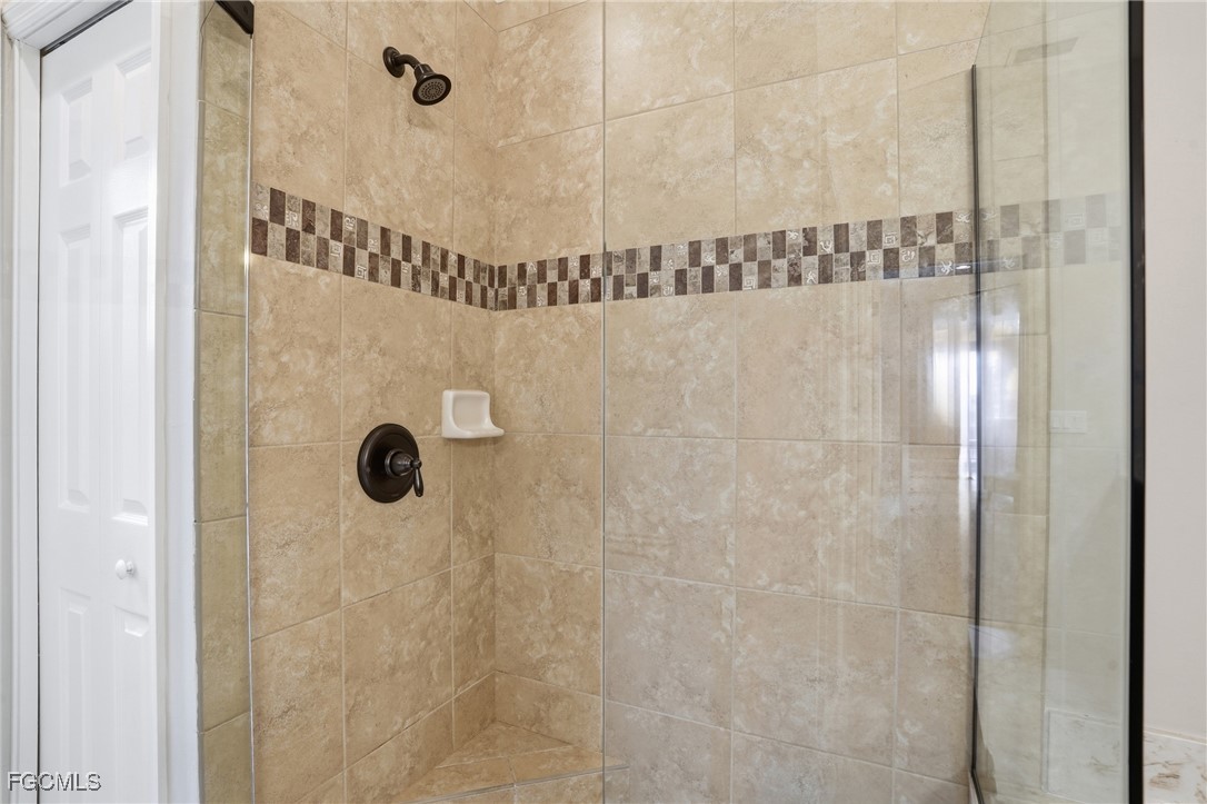 20604 Chestnut Ridge Drive North Fort Myers, FL 33917 - Photo 25 of 49 a bathroom with a shower