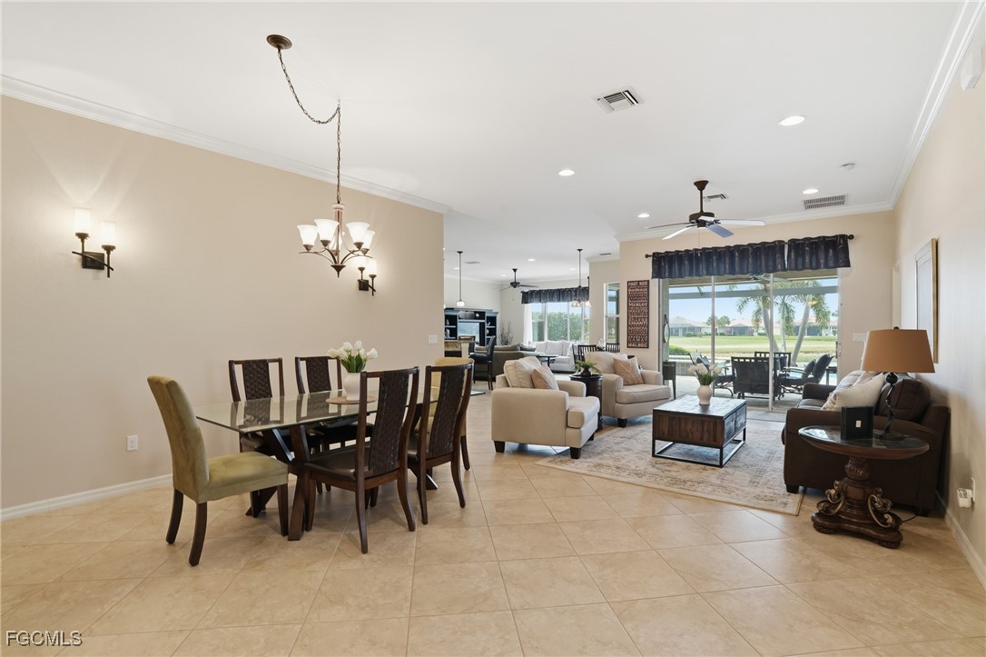 20604 Chestnut Ridge Drive North Fort Myers, FL 33917 - Photo 3 of 49 a view of a dining room with furniture window and outside view