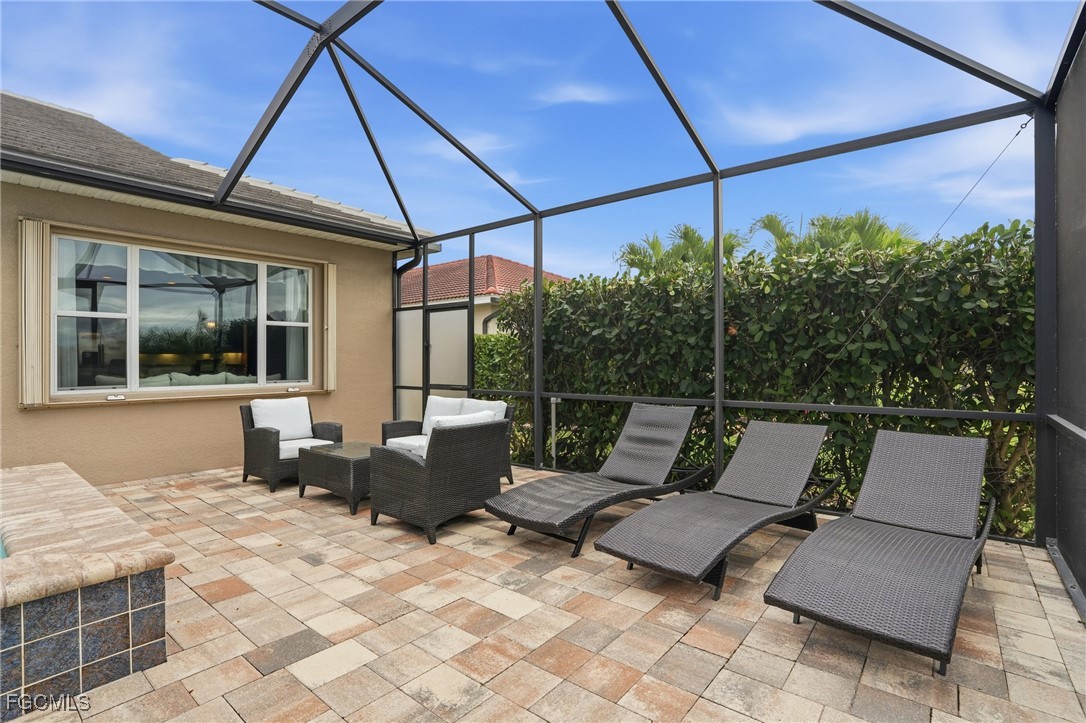 20604 Chestnut Ridge Drive North Fort Myers, FL 33917 - Photo 37 of 49 a roof deck with couch and chairs