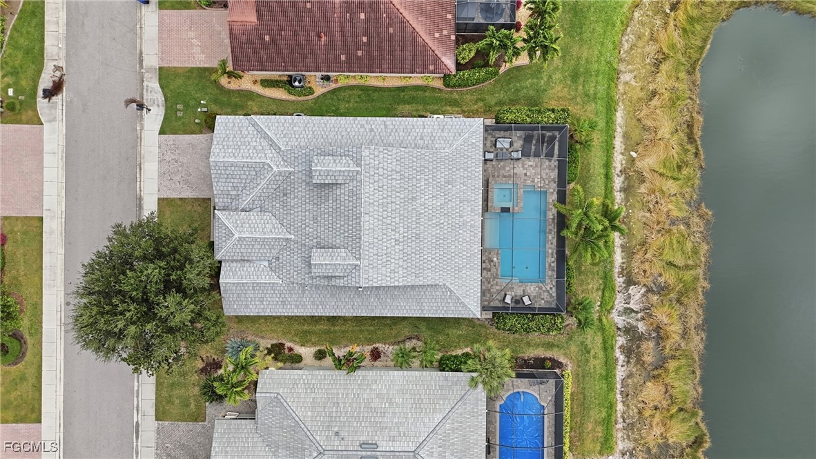 20604 Chestnut Ridge Drive North Fort Myers, FL 33917 - Photo 41 of 49 an aerial view of a house with a garden