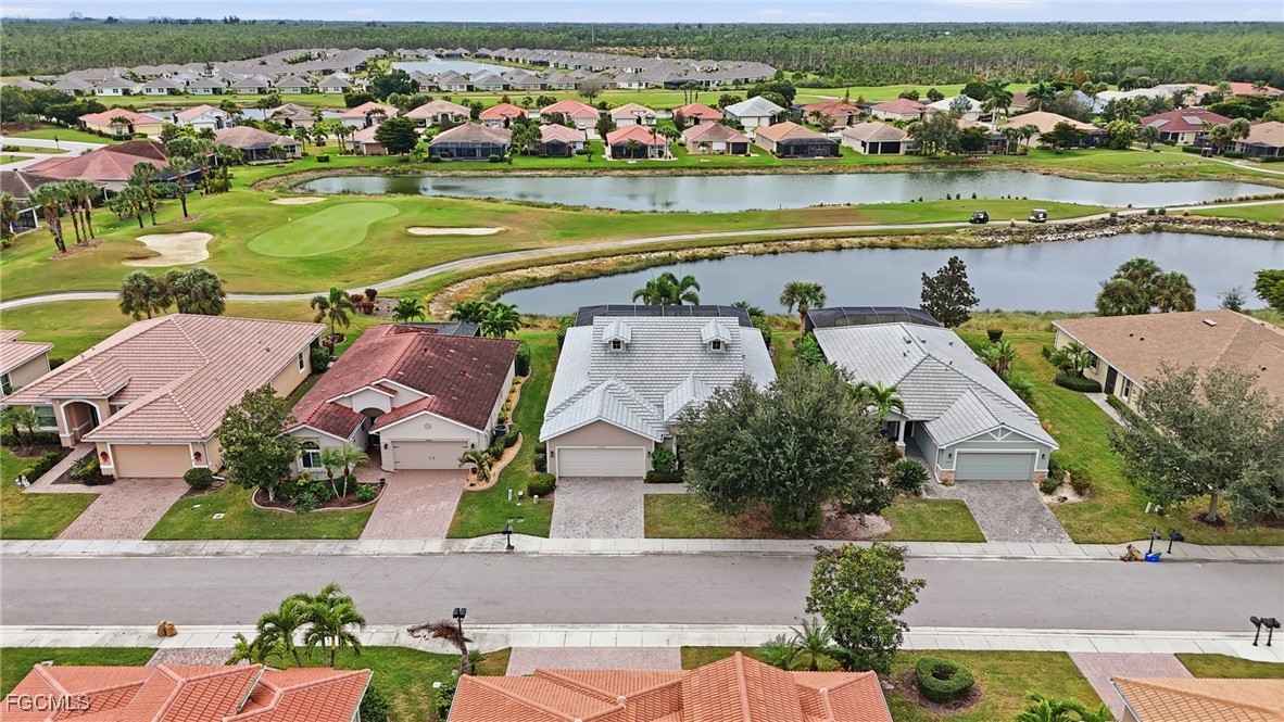 20604 Chestnut Ridge Drive North Fort Myers, FL 33917 - Photo 44 of 49 an aerial view of residential houses with outdoor space and river