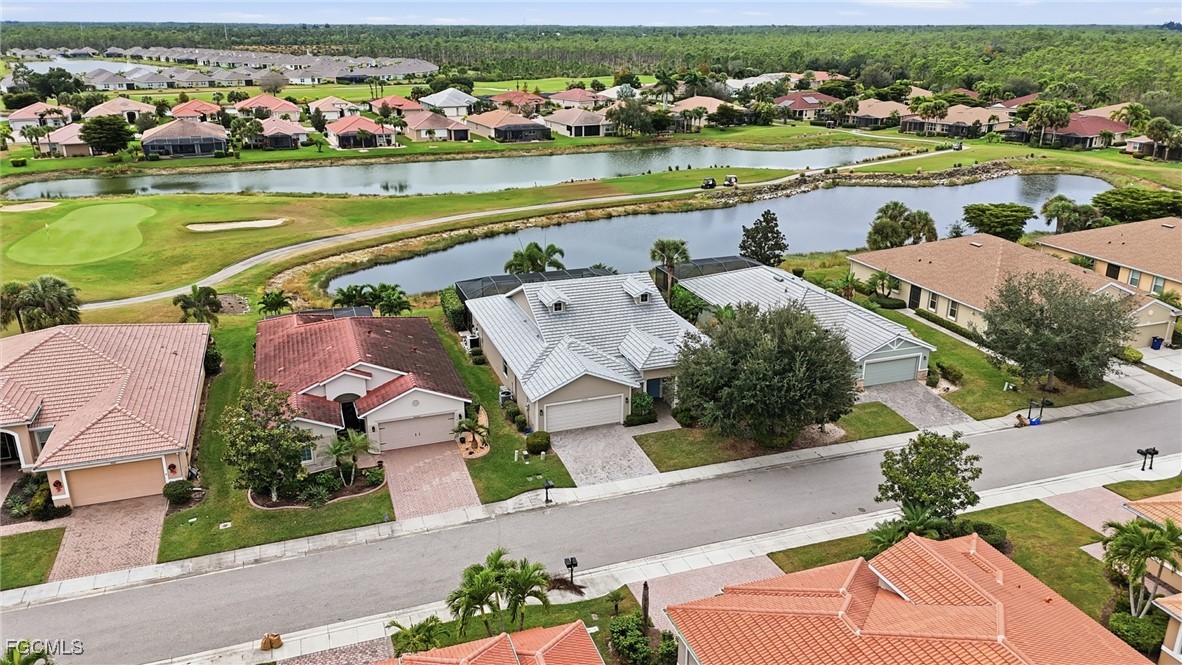 20604 Chestnut Ridge Drive North Fort Myers, FL 33917 - Photo 45 of 49 an aerial view of residential houses with outdoor space and river