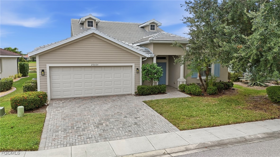 20604 Chestnut Ridge Drive North Fort Myers, FL 33917 - Photo 49 of 49 a front view of house with yard