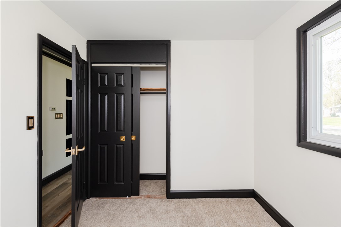 5240 Haverfield Road Dayton, OH 45432 - Photo 43 of 58 This bright room features a spacious closet, warm carpet, and abundant natural light.