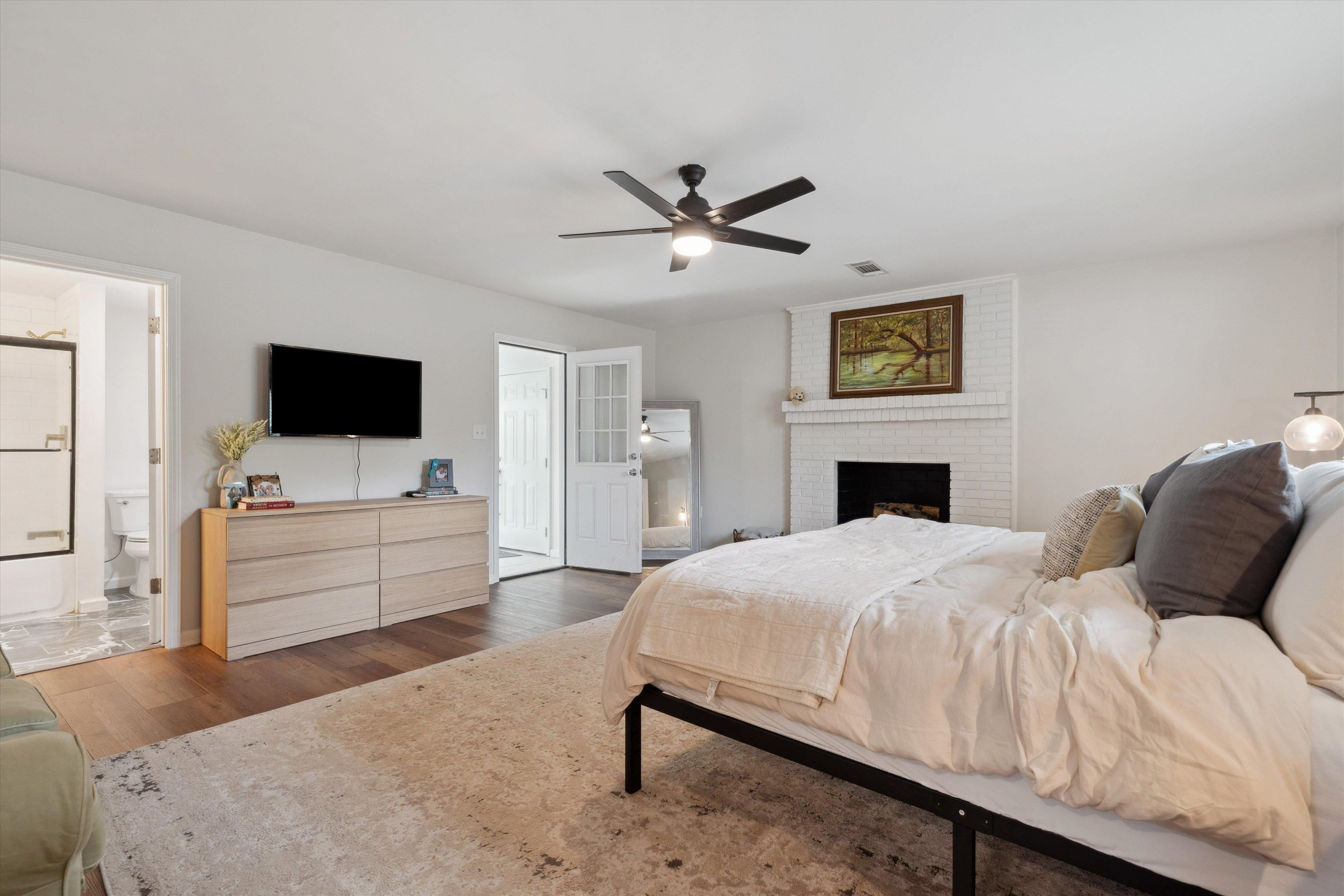940 Greencliff Road Collierville, TN 38017 - Photo 11 of 23 a bedroom with a bed and a flat screen tv